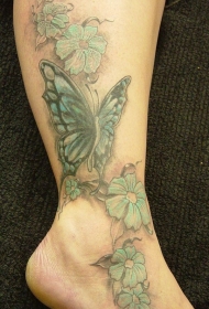 腿部彩色的蝴蝶和花卉纹身图案