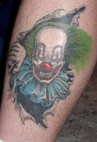撕裂皮肤邪恶的小丑纹身图案
