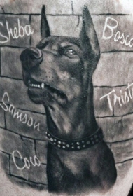 大臂黑白写实狗头像与字母纹身图案