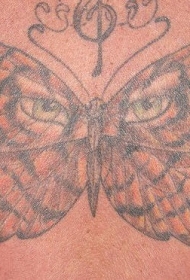 老虎眼睛与蝴蝶纹身图案
