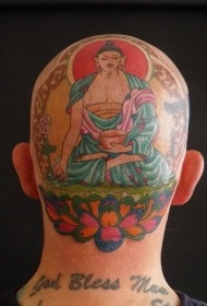男性头顶彩绘佛像与莲花纹身图案