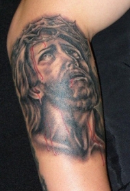 手臂耶稣流泪纹身图案