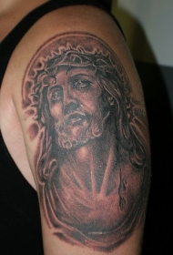 痛苦的Jesus黑色大臂纹身图案