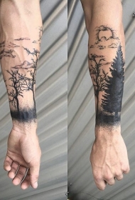 小臂黑色树木和太阳纹身图案