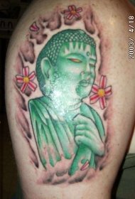 绿色佛像与花朵纹身图案
