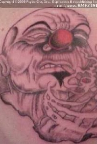 背部祈祷的小丑纹身图案