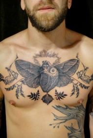 胸部黑色写实心脏与翅膀植物纹身图案