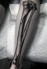 小腿黑色雕刻风格骨头纹身图案