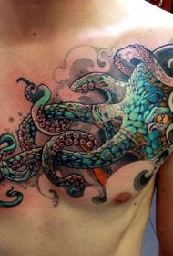 胸部黑色和绿色章鱼与橙色眼睛纹身图案
