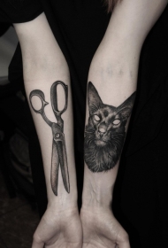 手臂恶魔猫与剪刀纹身图案