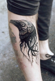 小腿独特的黑色乌鸦头纹身图案