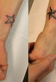 手臂不同的黑色星星纹身图案