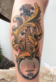 小腿彩色墨西哥吉他与装饰纹身图案