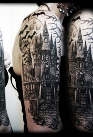 手臂可怕的黑白城堡与蝙蝠纹身图案
