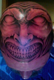 头部大笑的恶魔纹身图案