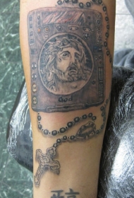 手臂棕色耶稣牌像纹身图案