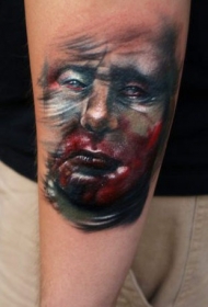 小臂血腥人脸肖像纹身图案