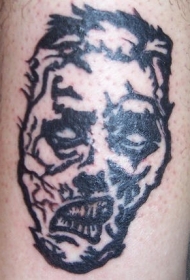 黑色粗线条僵尸男子脸纹身图案