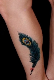 小腿不绿松石色孔雀羽毛纹身图案