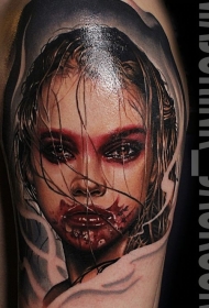 彩色恐怖风格血腥女人脸纹身图案
