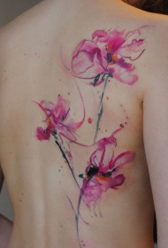 女性背部水彩色兰花纹身图案
