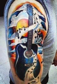 肩部彩色吉他与音乐纹身图案