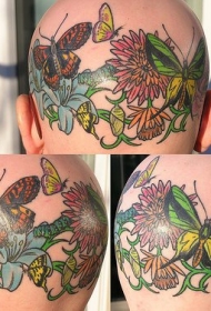头部彩色如画的蝴蝶和花纹身图片