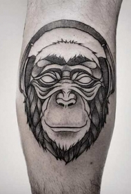 腿部简约滑稽猴头与耳机纹身图案