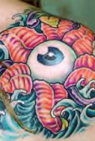 肩部超现实的眼球海星浪花纹身图案