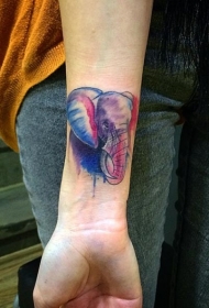 手腕泼墨风格彩绘大象头像纹身图案