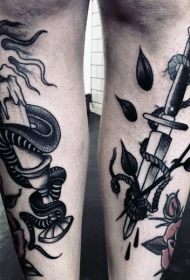 小腿old school燃烧蜡烛与蛇和匕首绳子纹身图案