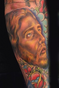 手臂彩色耶稣头像纹身图案
