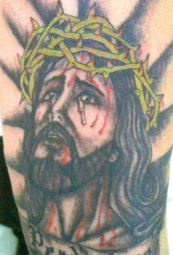 腿部彩色耶稣头像纹身图案