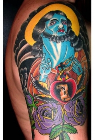 肩部超现实色彩的耶稣纹身图案