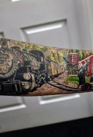 花臂非常逼真的五彩西部火车纹身图片