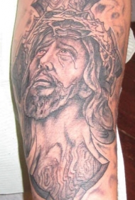 腿部哭泣的耶稣纹身图案