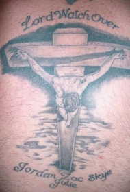 腿部棕色耶稣十字架纹身图案