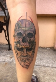 腿部黑白点刺纹身人物肖像纹身和骷髅头纹身图片