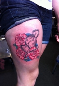 女生大腿上彩绘水彩创意花朵和怀表纹身图片