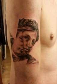 人物肖像纹身 男生手臂上黑灰纹身人物图腾