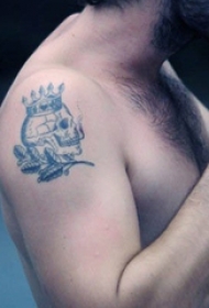 男生手臂上黑色植物素材简单个性骷髅头纹身图片