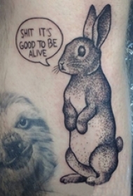 男生小腿上黑色点刺简单线条英文和小动物兔子纹身图片