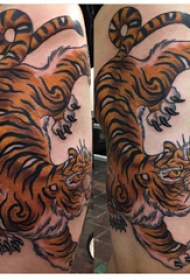 纹身大腿男 男生大腿上彩色的老虎纹身图片