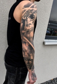 纹身猫头鹰 男生手臂上猫头鹰纹身图片