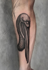 手臂纹身图片 男生手臂上黑色的鸟纹身图片