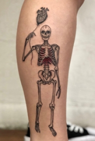 欧美小腿纹身 女生小腿上心脏和骷髅纹身图片