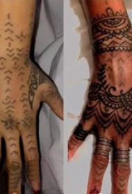 蕾哈娜手上纹身   蕾哈娜手上黑色的部落图腾纹身图片