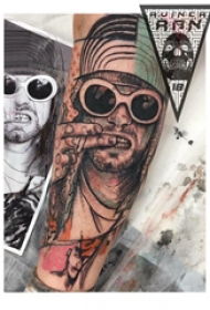 人物肖像纹身  男生手臂上彩绘的人物肖像纹身图片
