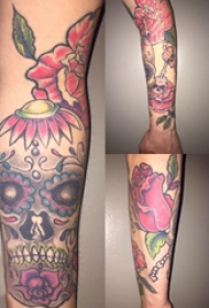 骷髅和花朵纹身图案  女生手臂上创意骷髅和花朵纹身图片